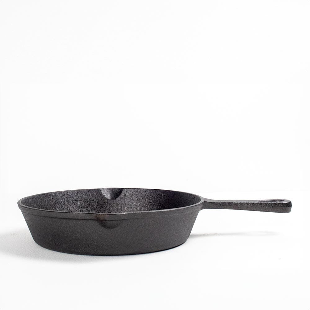 Season pre-seasoned cast iron frying pan