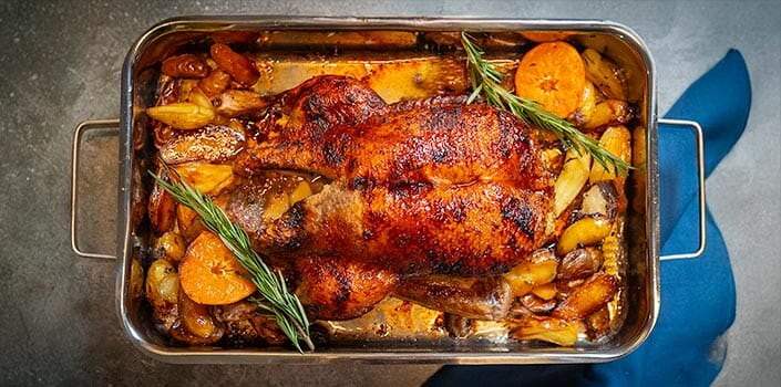 Crispy-Skinned Roast Duck with Clementines & Winter Spices