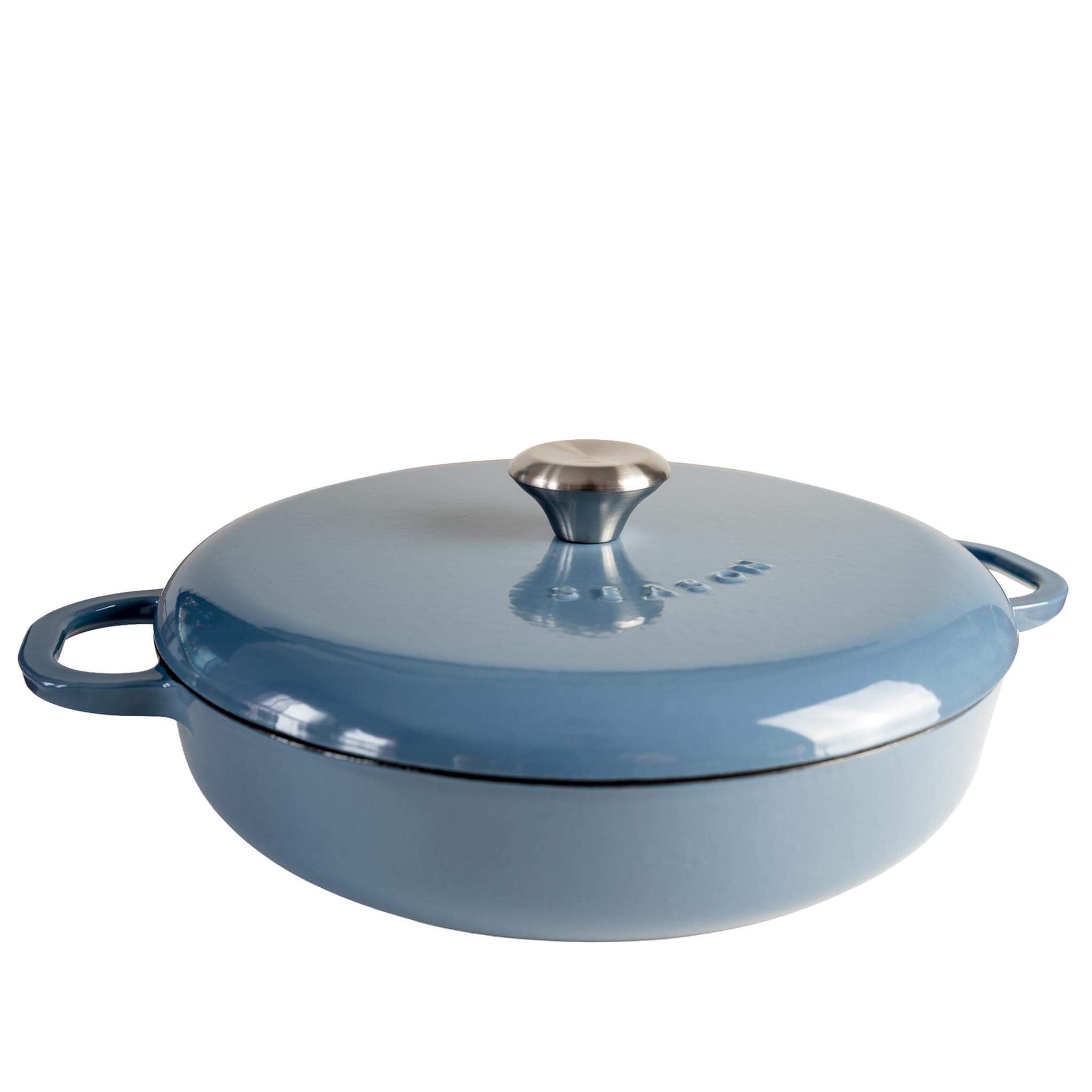 Assaisonner une cocotte peu profonde en fonte, couleur terre cuite